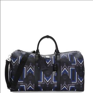 MCM leather duffle w/ tags.